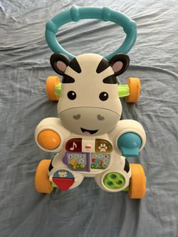 Interactive Walker, Lights Up/Teaches On The Front & Helps Toddlers Learn To Walk! 20$ OBO