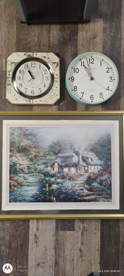 Clocks and wall picture.