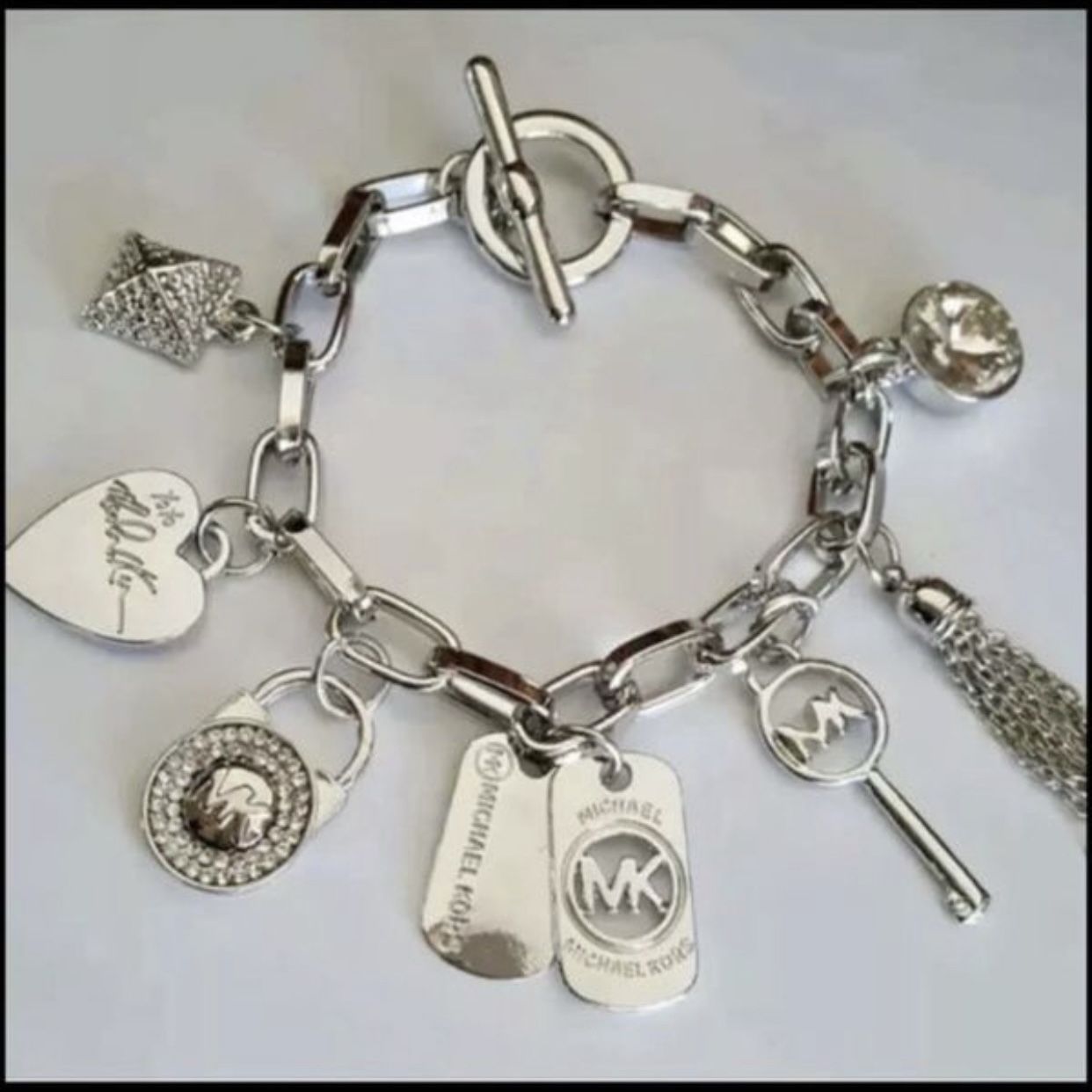 Mk Charms Bracelet Bangle 7.5” Long