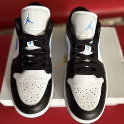 Size 9 women's Nike Air Jordan 1 Low sneakers Shoes/Zapatos (black/white with University Blue)