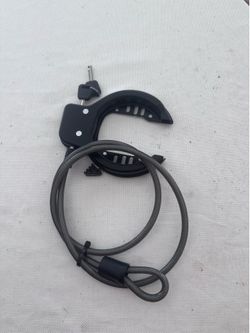This is a heavy-duty handcuff-style bicycle or scooter lock designed to secure vehicles to fixed objects.The locking mechanism is constructed from hig