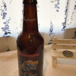 LARGE EMPTY BUDWEISER BOTTLE,WITH SALUTE U.S NAVY , ON FRONT, (EMPTY) $15.00