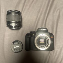 Canon EOS Rebel T7 + 18-55 mm lens