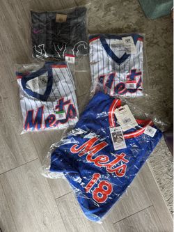 4 brand new Large Mets jerseys