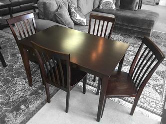Brand new 4 chair dining table