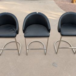 3 Black Barstools. Metal Frame. Few Rips. 