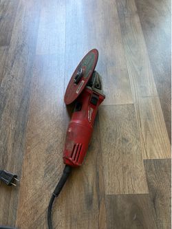 Milwaukee grinder corded with 6 1/2” Diablo disc