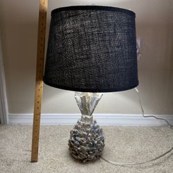 Table lamp with sculpted base