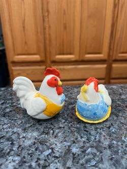 Vintage Ceramic Chicken Rooster Pair of Salt and Pepper Shakers.  Size tallest approximately 2 1/2 inches tall.  Preowned never used, stickers on the 