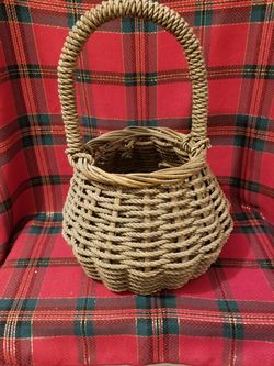 Vintage woven twine basket .