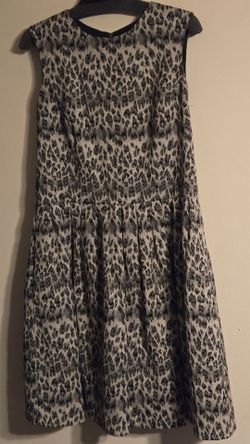 Black and white print sleeveless dress with sheer back panels