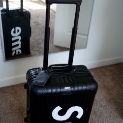 RIMOWA SUPREME