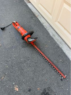 24 in. 3.3 Amp Corded Dual Action Electric Hedge Hog Trimmer with Rotating Handle
