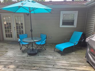 Patio table/umbrella/chairs ( including chaise)