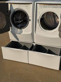 Great  front load lg washer and front load lg dryer high efficiency with pedestals  in excellent working condition condition no problems at all with w