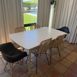 Mid Modern white wood and black dining chairs and table