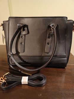 New With Tags Black vegan handbag with Crossbody strap.
