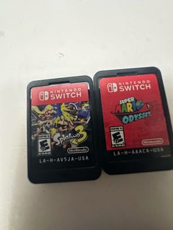 Nintendo switch games Mario odyssey and splatton 3