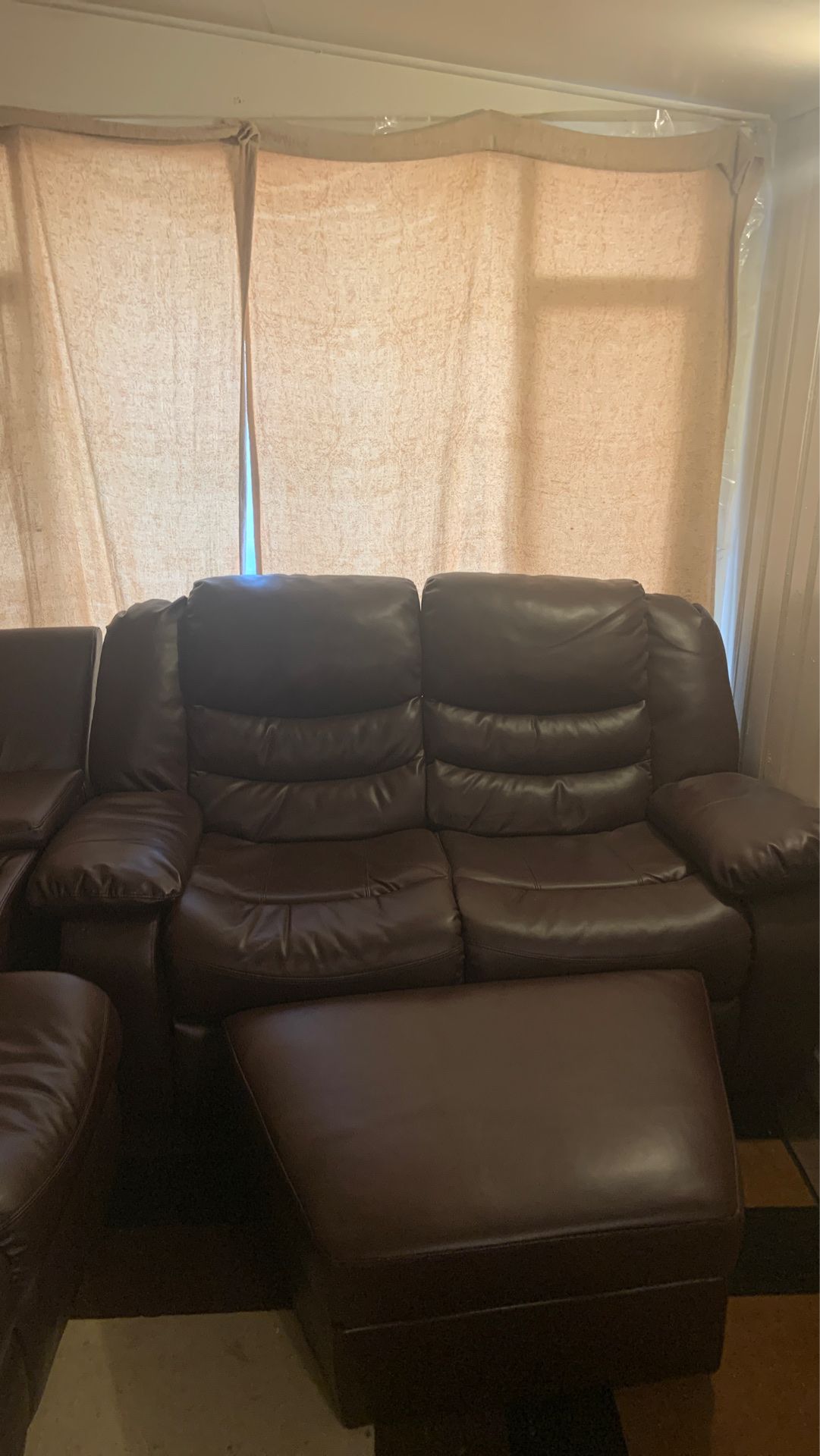 Brown leather sectional couch