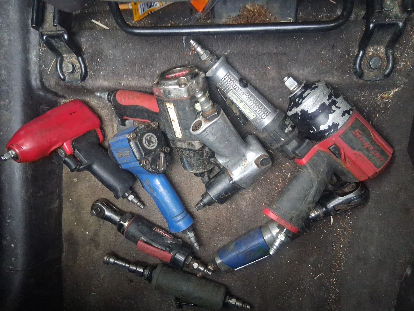 Air impacts and air ratchets with die grinders
