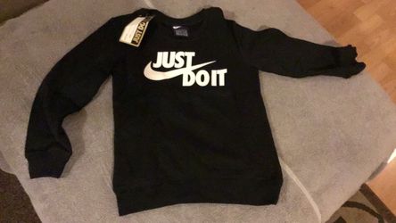 New Nike sweater de ninos Talla siete