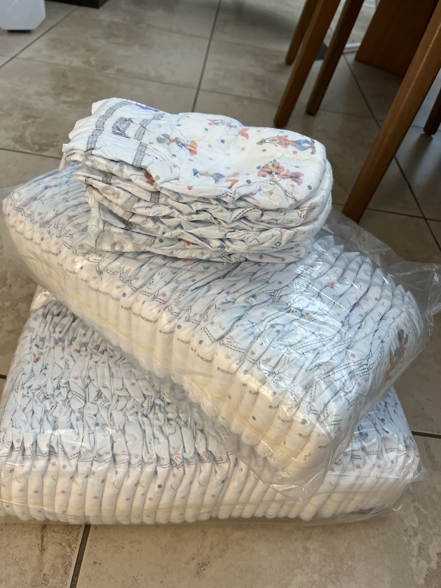~100 Size 3 Huggies Diapers