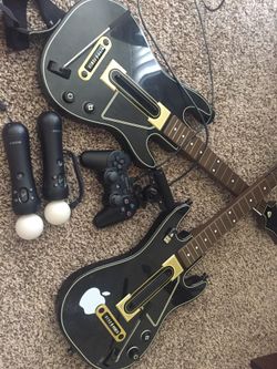 PS3 with 20+ games & controls- $200