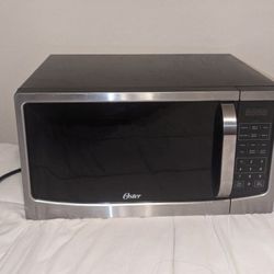 Oster 1.6 Cu Massive Microwave