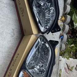 Subaru Legacy left and right headlights 2000-2006