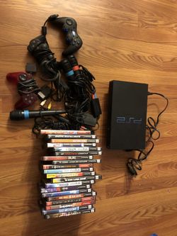 Ps2 game console with games $140