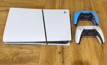 PlayStation 5 with 2 controllers