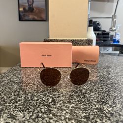 Miu miu Glasses