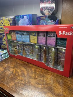 PRISMATIC EVOLUTIONS 8 TIN PACK