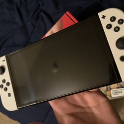 OLED Nintendo Switch (3 Games)