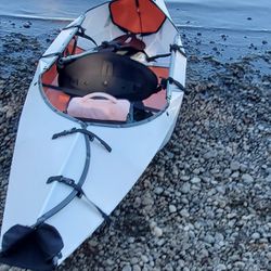 brand new oru inelt kayak. paddles and life vest included