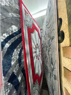 Area Rug with Red and Gray Floral Design