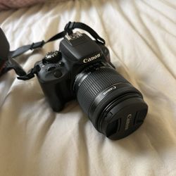 Canon EOS Rebel SL1 DSLR Camera And Lense