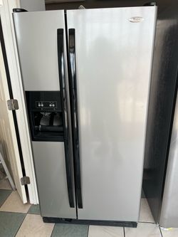 Whirlpool stainless steel refrigerator ( delivery available)