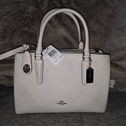 Brand new coach purse with tag and dust bag