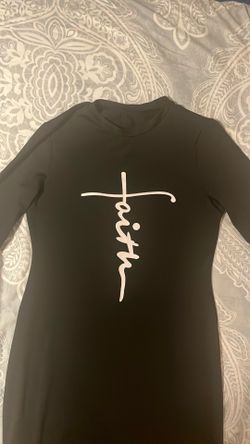 Modeling, a black long sleeve dress