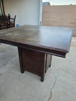 Brown tall dining table