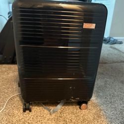 20” Hard side Jessica Simpson Suitcase
