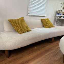Floating Sofa on Sculptural Walnut Legs