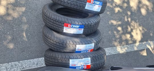 TRAILER TIRE AND RIM 13 INCH 5 LUG