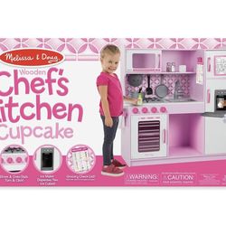 Melissa & Doug Wooden Chef’s Pretend Play Toy Kitchen with “Ice” Cube Dispenser – Cupcake Pink/White