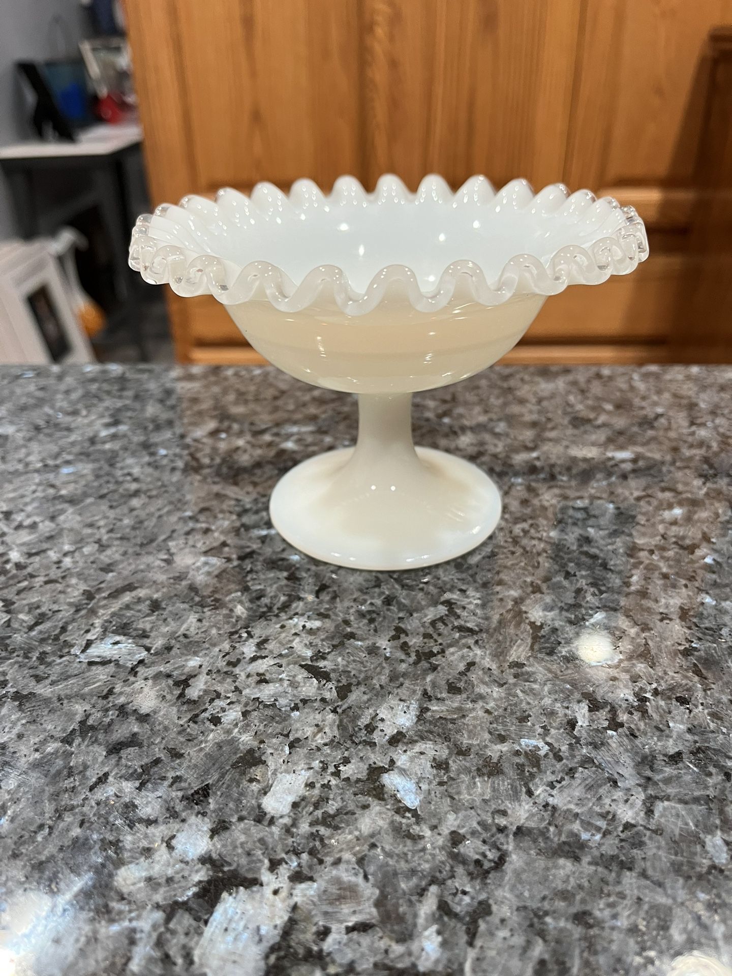 Vintage 1950’s Fenton  Milk Glass with Ruffled Edge, Footed Pedestal Candy or Nut Dish.  Size approximately 5 1/2 inches tall.  Preowned used Excellen