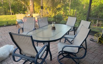 Patio table with  6 Chairs  , and 1  extra Food Rest