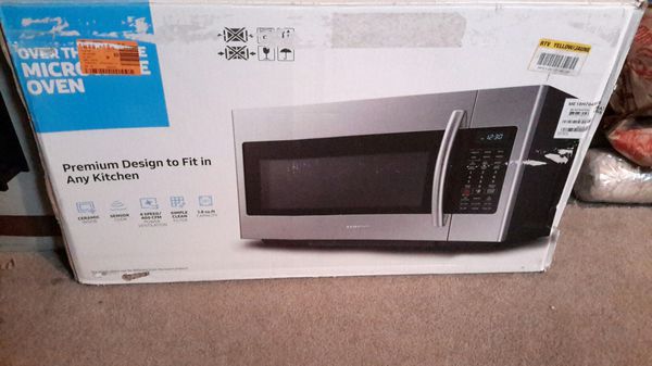 NEW IN BOX SAMSUNG 30" W 1.8 cu. ft. Over the Range Microwave in Stainless Steel Finish, Model ME18H704SFS Can deliver