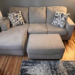 Reverse Sectional Couch , Chair And Ottoman 