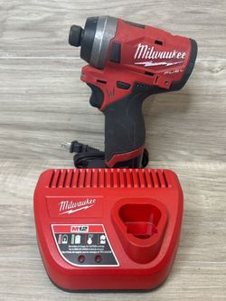 Milwaukee M12 Fuel 2553-20 1/4-Inch Impact Driver With Battery Charger (PO1026401)